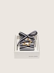 Skins black and white laces with star-shaped snap hook