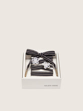 Skins white and dark blue striped laces with beaded charms