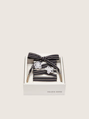 Skins white and dark blue striped laces with beaded charms