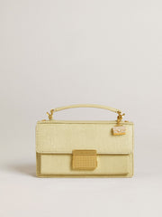 Purse-shaped charm in gold-colored brass with crystals