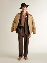 Beige bomber jacket with leather and patch details