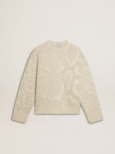 Women’s beige CNY sweater with patterns