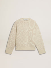 Women’s beige CNY sweater with patterns