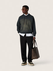 Unisex hooded sweatshirt in black cotton with a bleached effect