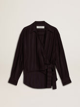 Women's black shirt with vertical stripes and side knot closure