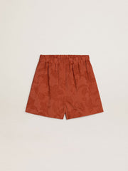 Women's shorts in brick-red jacquard with marine floral pattern