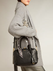 Vita Bag in black sheepskin leather with gold details