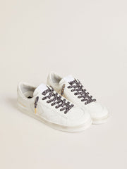 Gray and black animal-print laces with contrasting gold logo