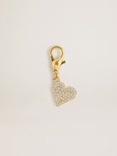 Heart-shaped charm in gold-colored brass with crystals