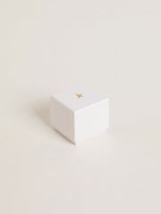 Heart-shaped charm in silver-colored brass with crystals