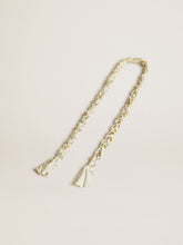 Butter-colored braided fabric charm with brass chain