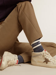 Blue socks with contrasting white stripes and white logo