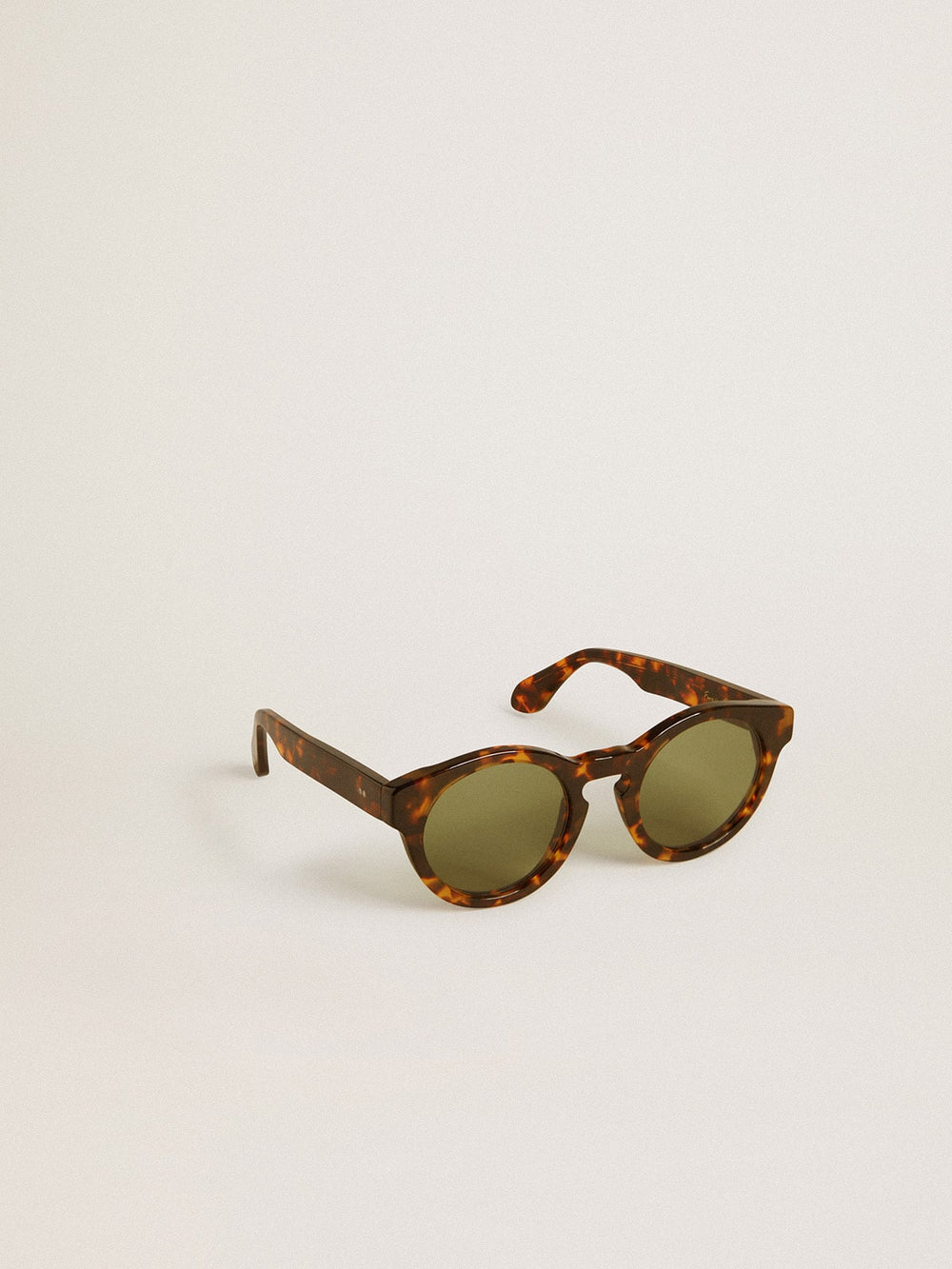 Square style Panthos sunglasses with havana brown frame and green lenses