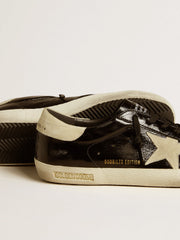 Men's Super-Star in black patent leather with suede star and heel tab