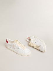 Matchstar in glossy white leather with glossy red leather heel tab