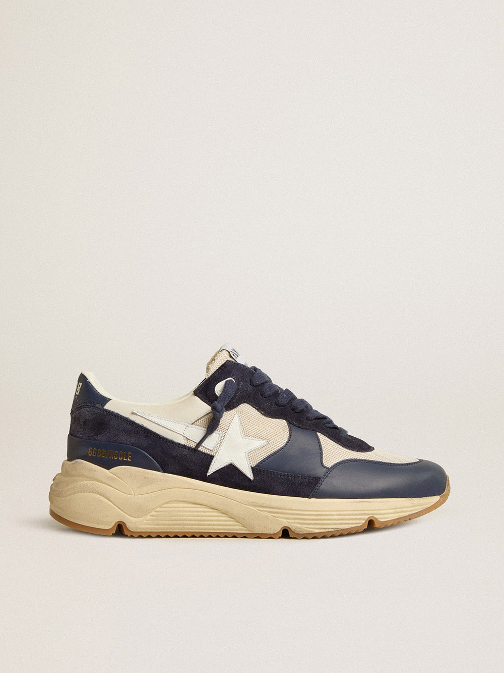 Running Sole in cream mesh and blue leather with a white leather star