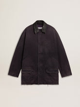 Men's denim jacket with distressed details and leather collar