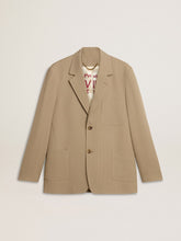 Men's beige pinstripe single-breasted jacket with an oversized fit