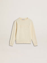 Girls’ cream-colored sweatshirt with patch writing