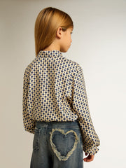 Girls' polo shirt with geometric print