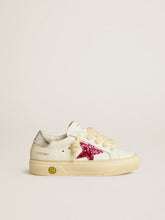 May Young with fuchsia glitter star and metallic leather heel tab