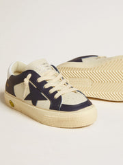 May Young in white and blue leather with leather star and heel tab