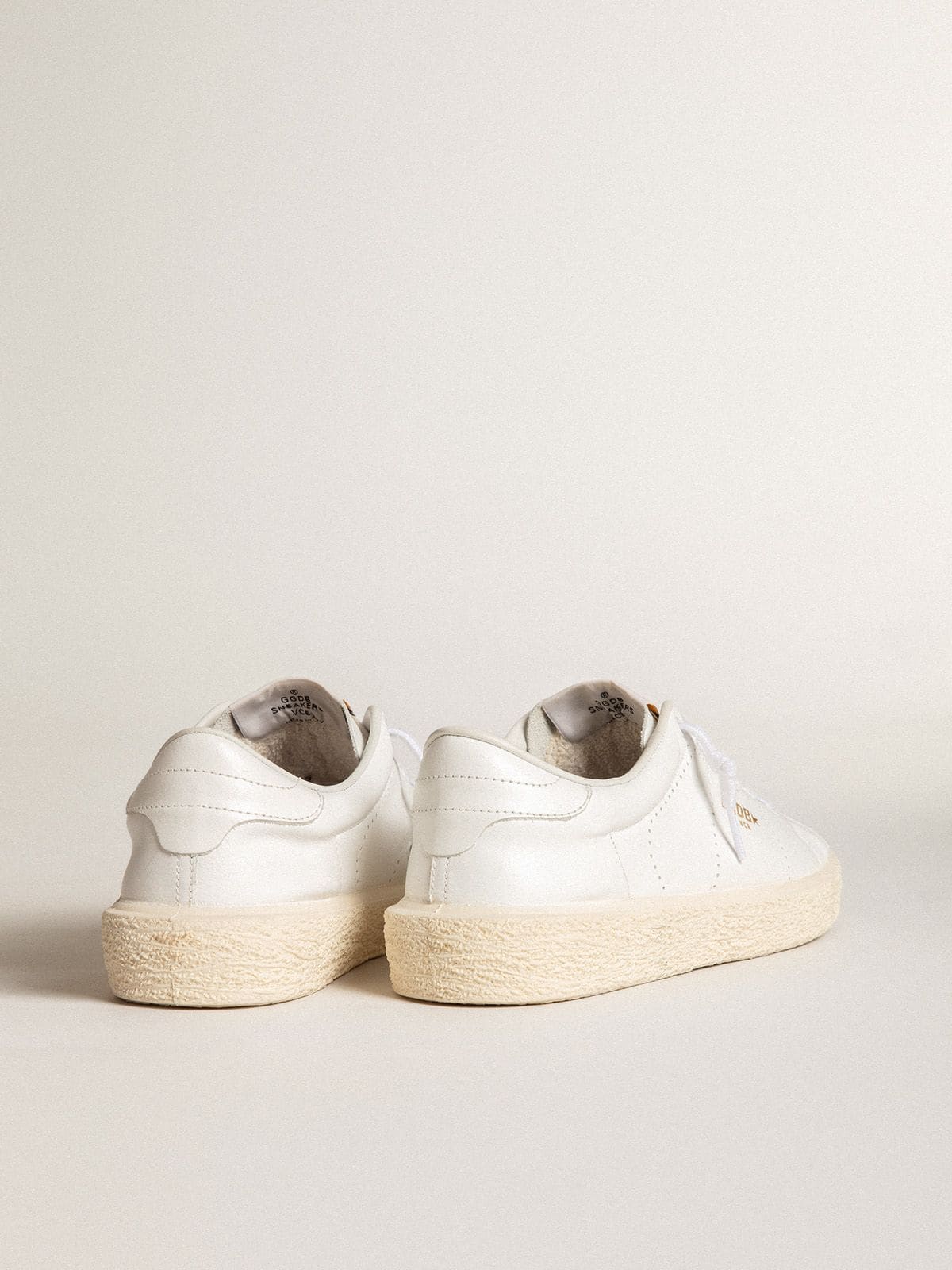 Women’s Tennis in white leather