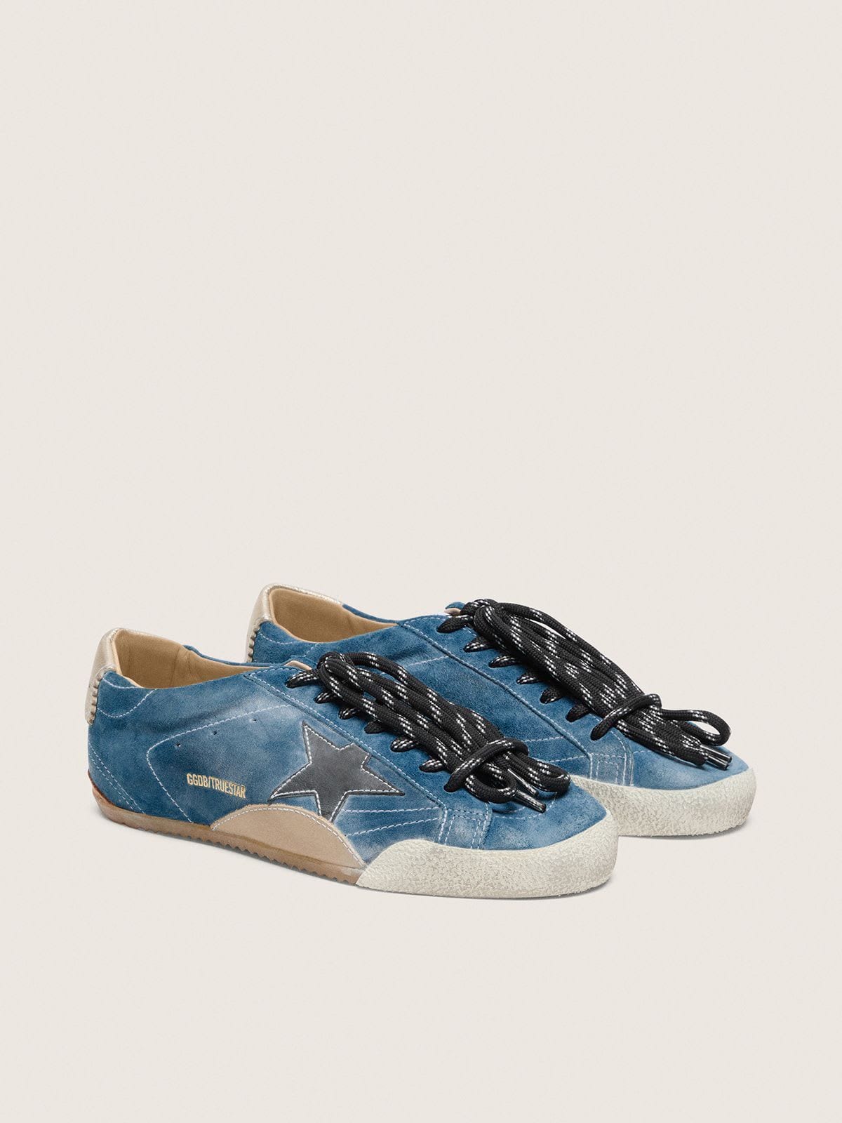 Women's True-Star in teal suede with black star and cream heel tab