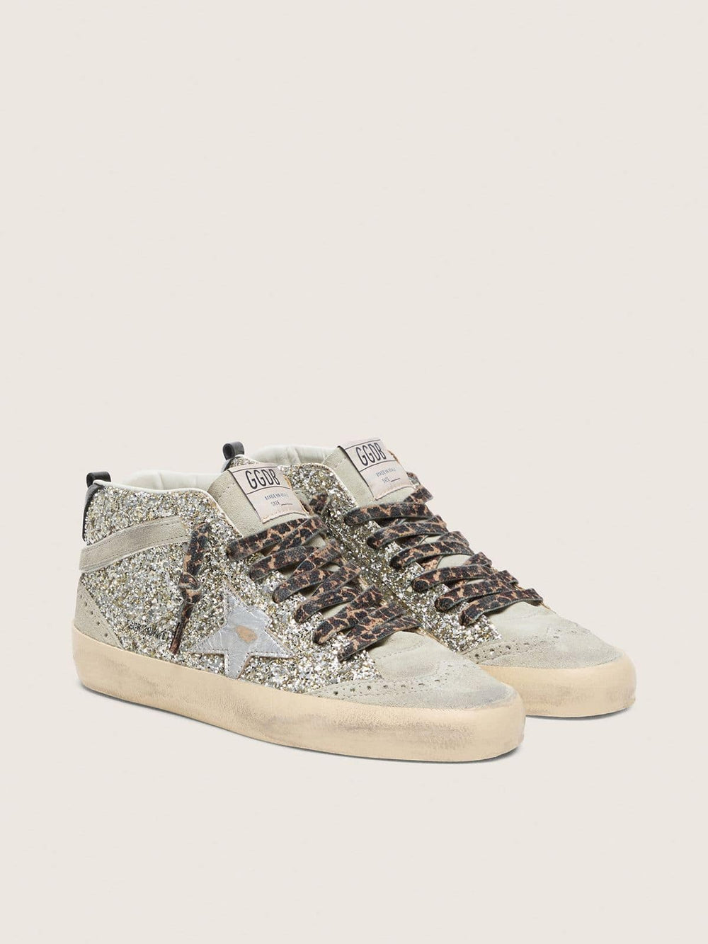 Mid Star  in silver glitter with silver metallic leather star