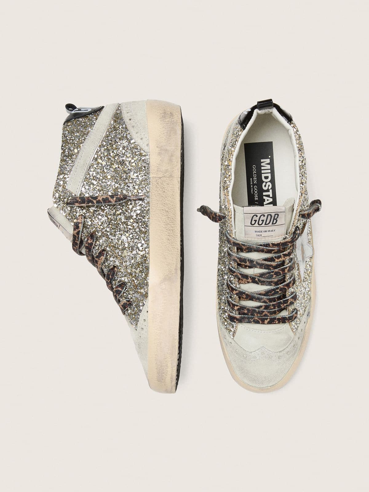 Mid Star  in silver glitter with silver metallic leather star