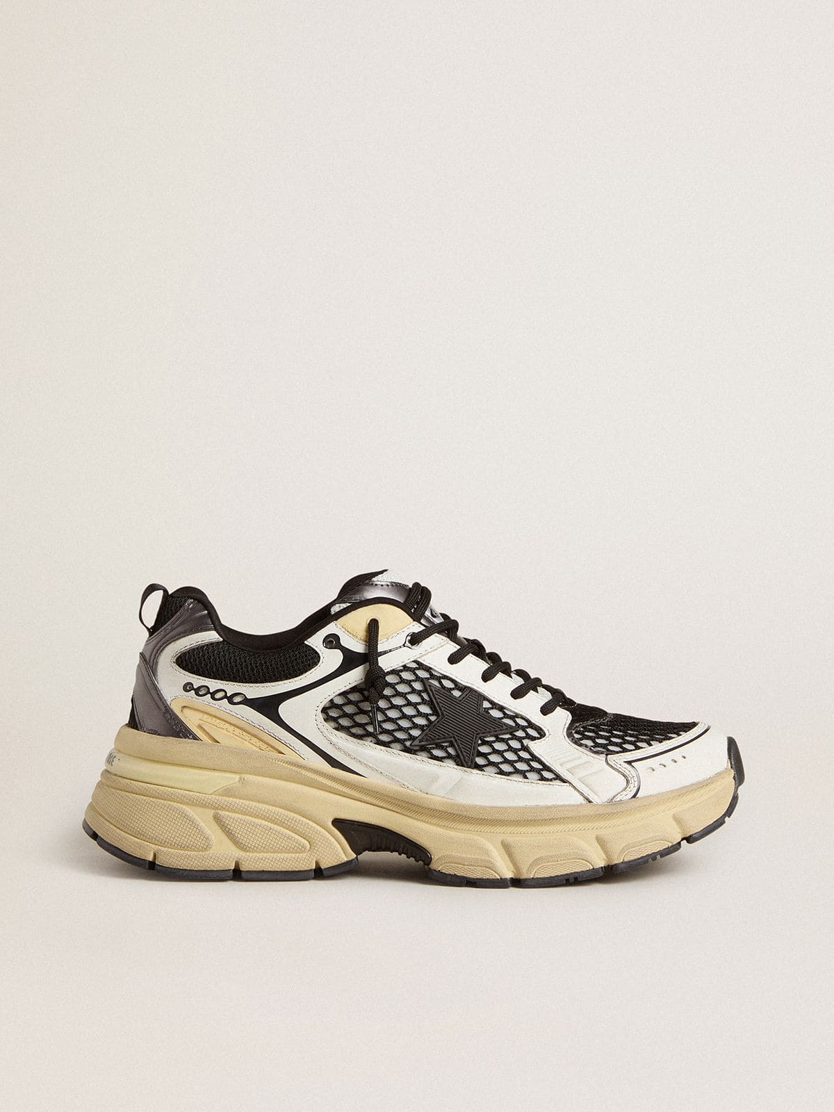 Women’s Lightstar in white leather and black mesh with black TPU star
