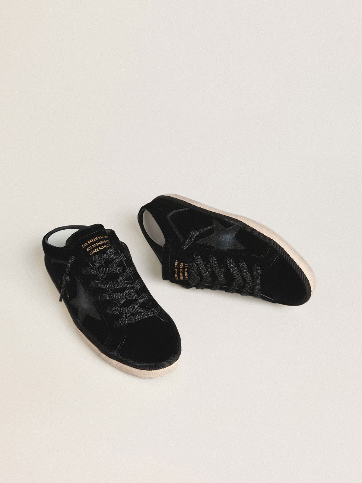 Women's Super-Star Sabots in black velvet with a black leather star with micro-glitter