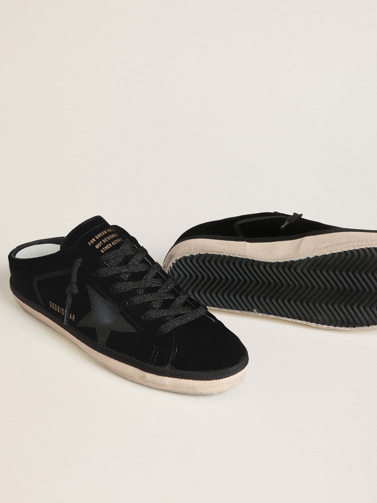 Women's Super-Star Sabots in black velvet with a black leather star with micro-glitter
