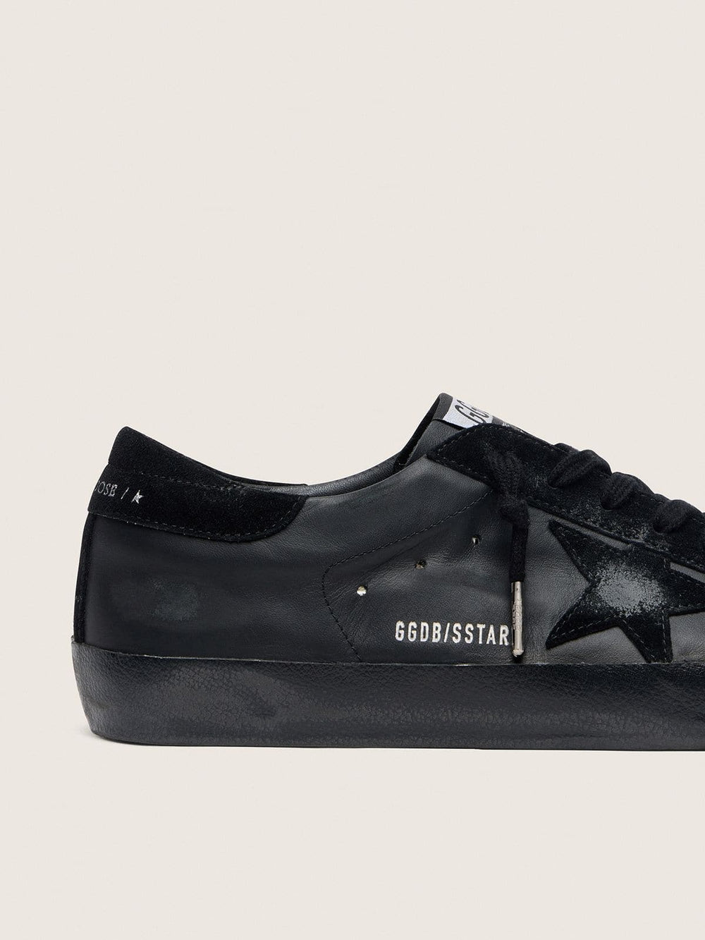 Women's Super-Star in black nappa with black suede star and heel tab