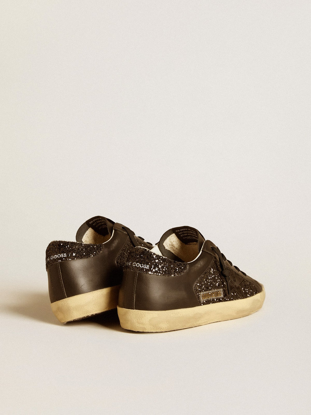Women's Super-Star in black glitter with black suede star and leather inserts