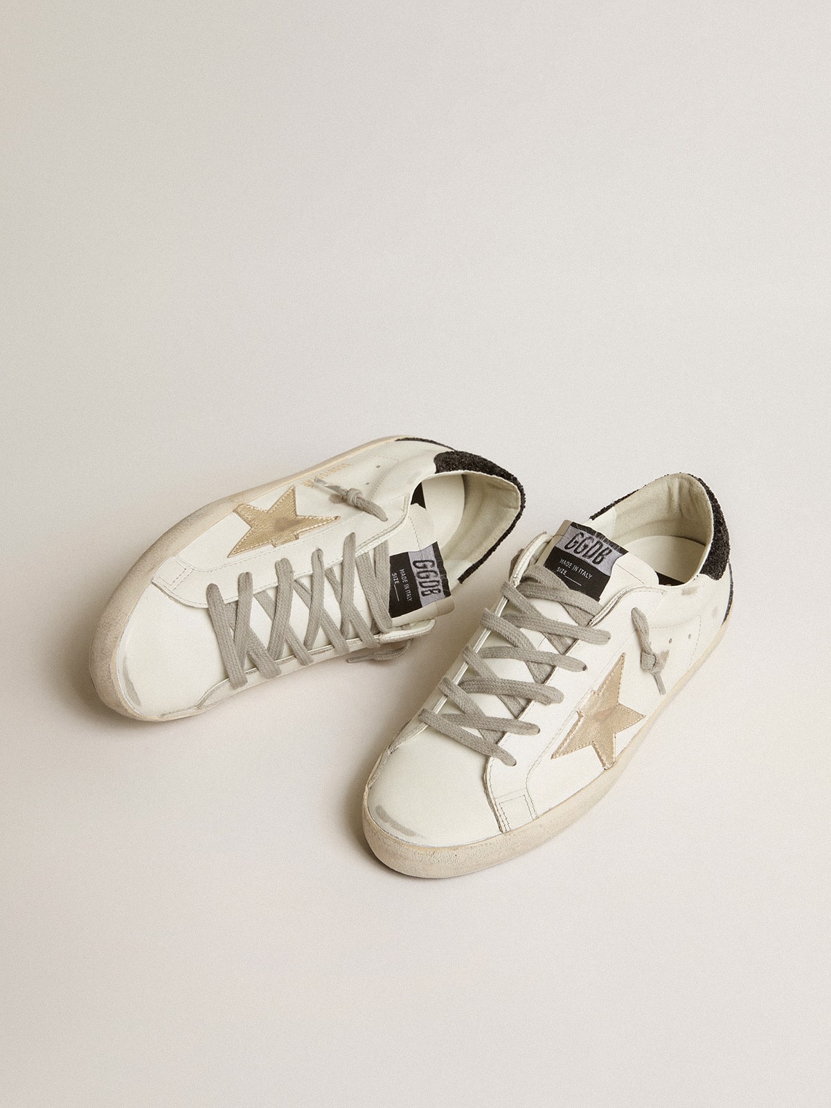 Women's Super-Star with gold star and black glitter heel tab