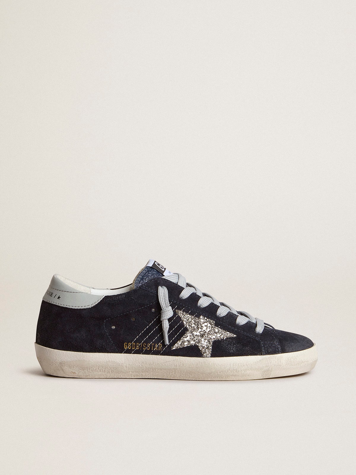 Women’s Super-Star in blue suede with silver glitter star and leather heel tab