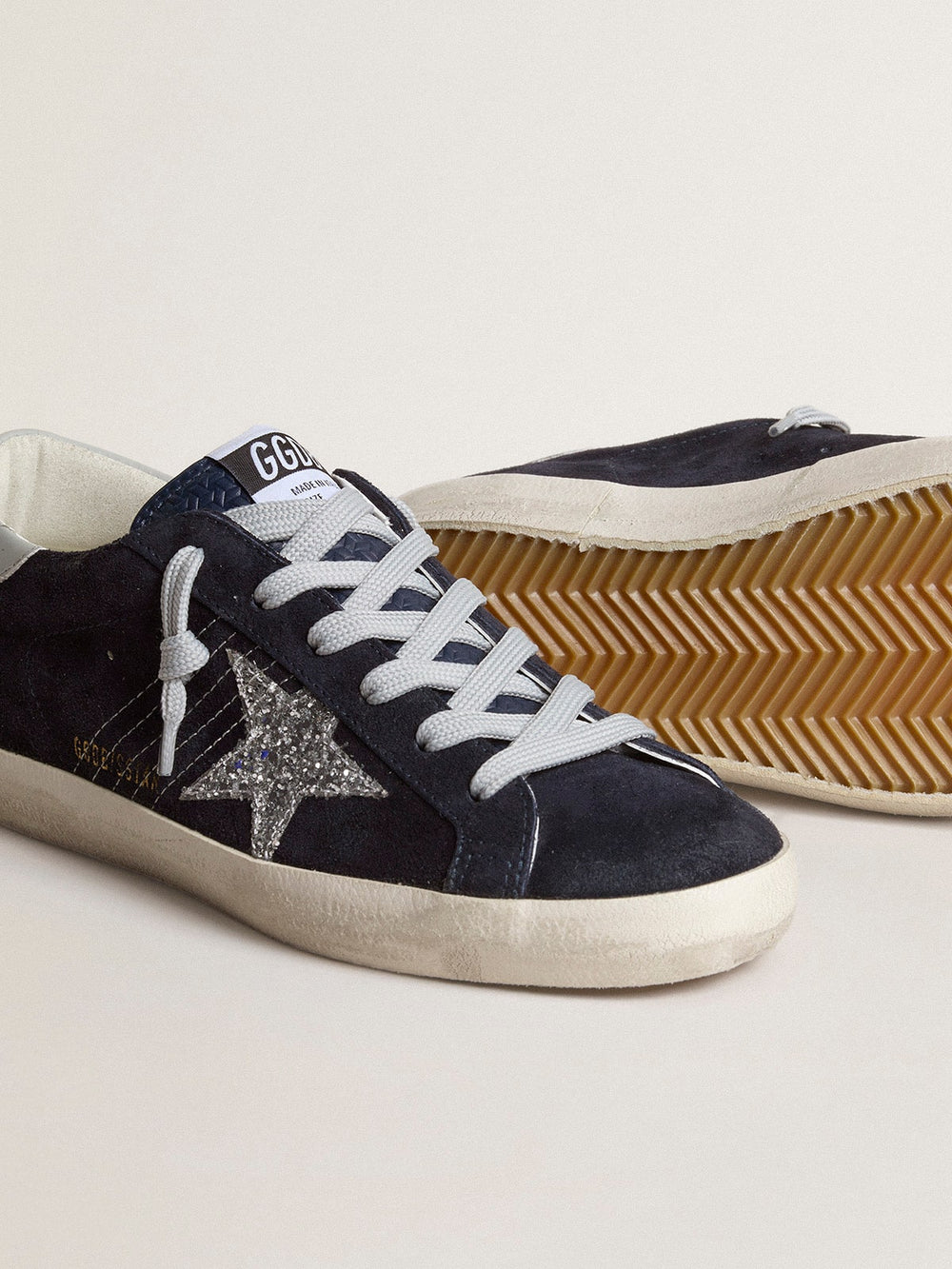 Women’s Super-Star in blue suede with silver glitter star and leather heel tab