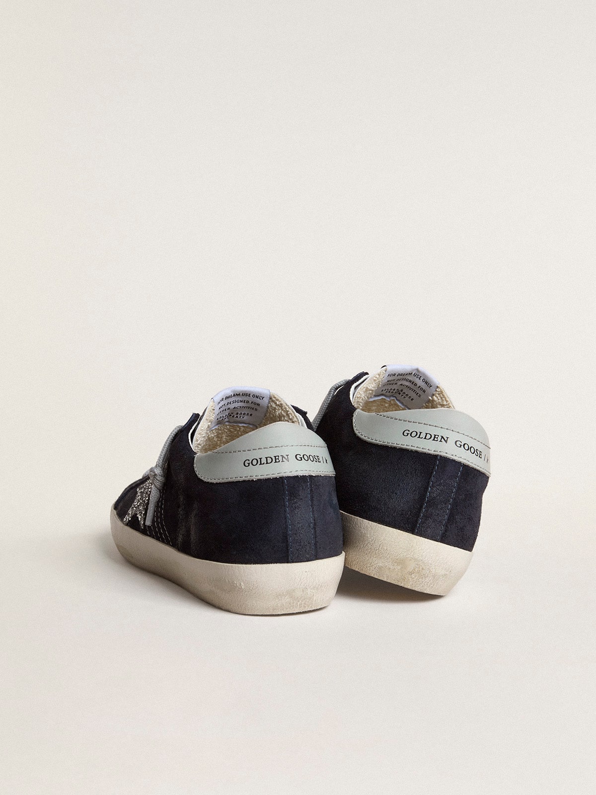 Women’s Super-Star in blue suede with silver glitter star and leather heel tab