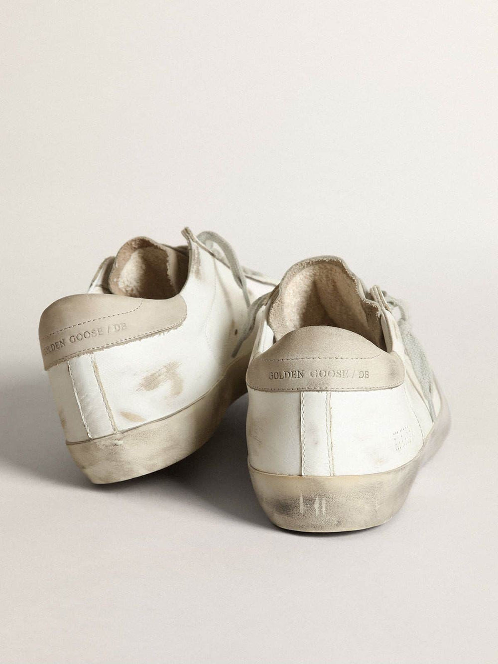 Women's Super-Star in white leather with perforated star and beige nubuck heel tab