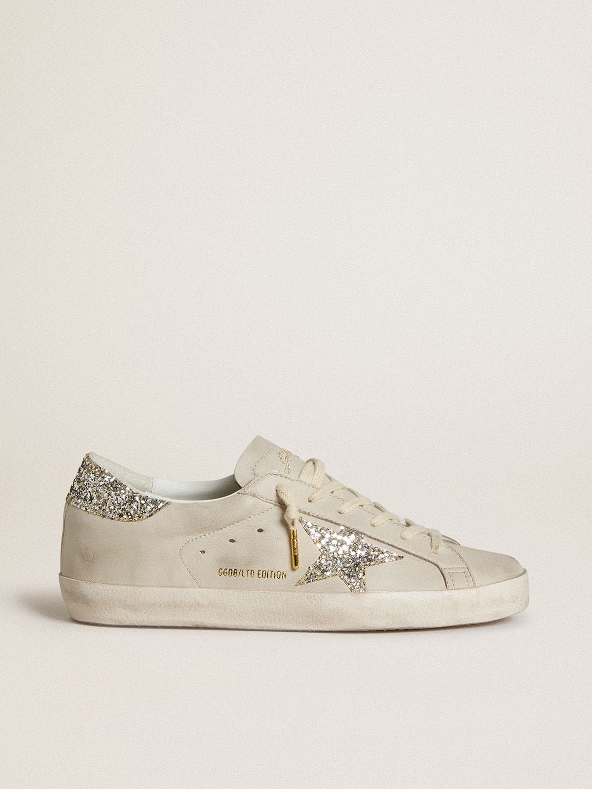 Women's Super-Star  in ivory nappa leather with platinum glitter star and heel tab