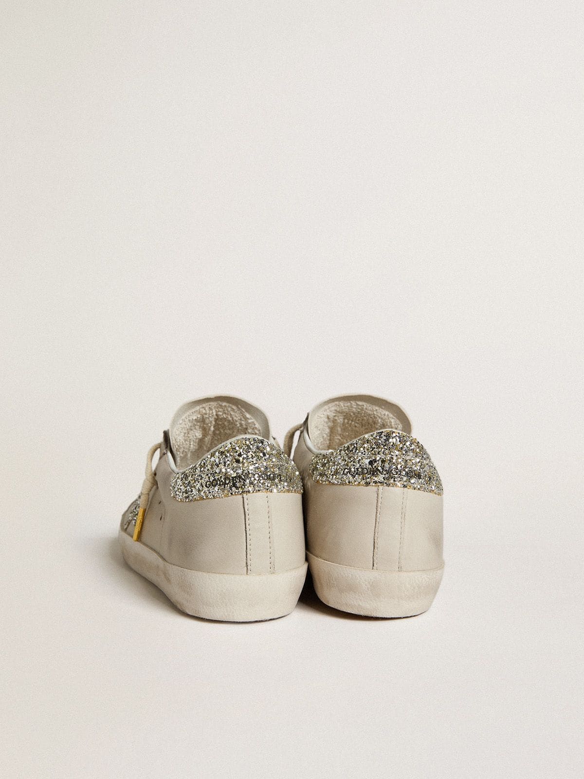 Women's Super-Star  in ivory nappa leather with platinum glitter star and heel tab