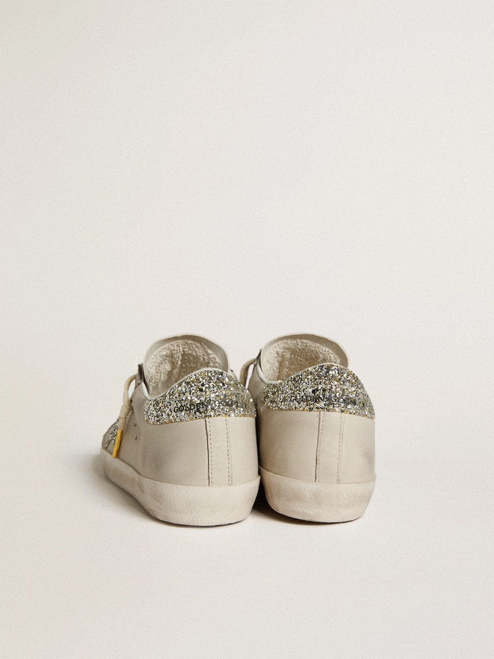 Women's Super-Star  in ivory nappa leather with platinum glitter star and heel tab