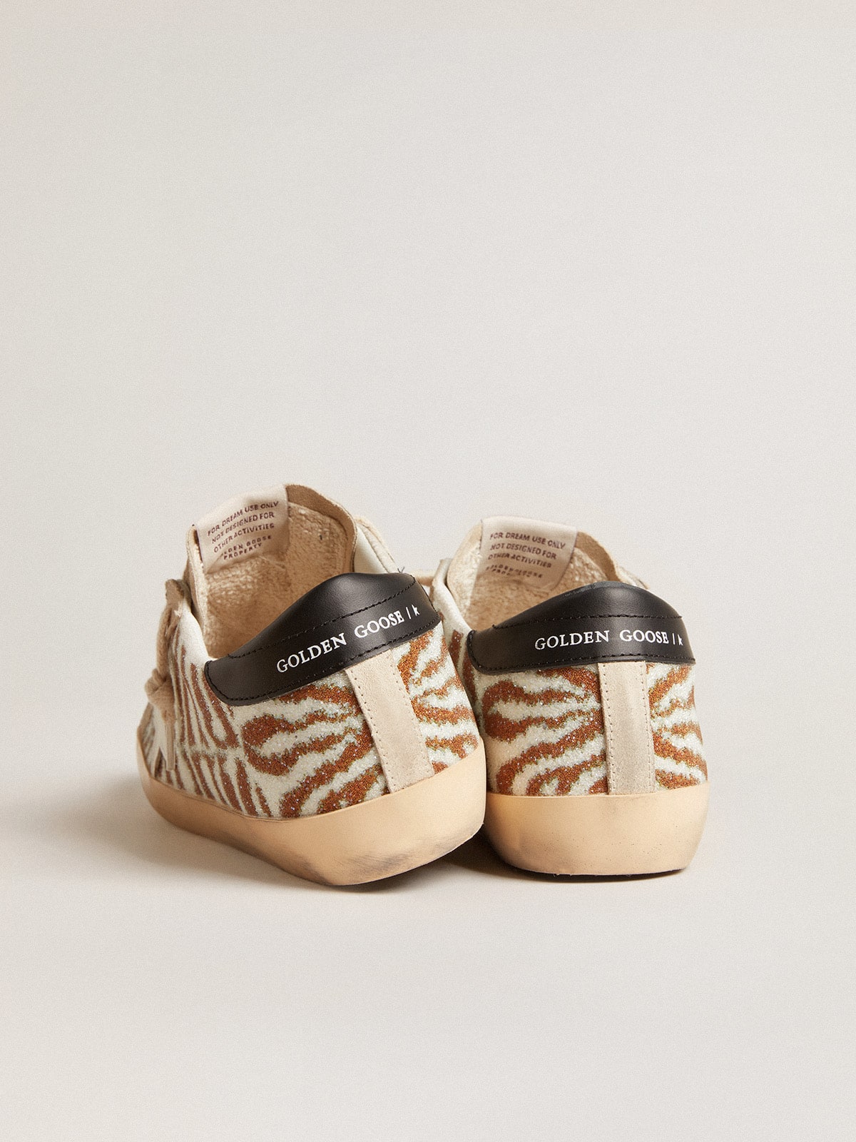Super-Star  in zebra-effect Swarovski with a white leather star