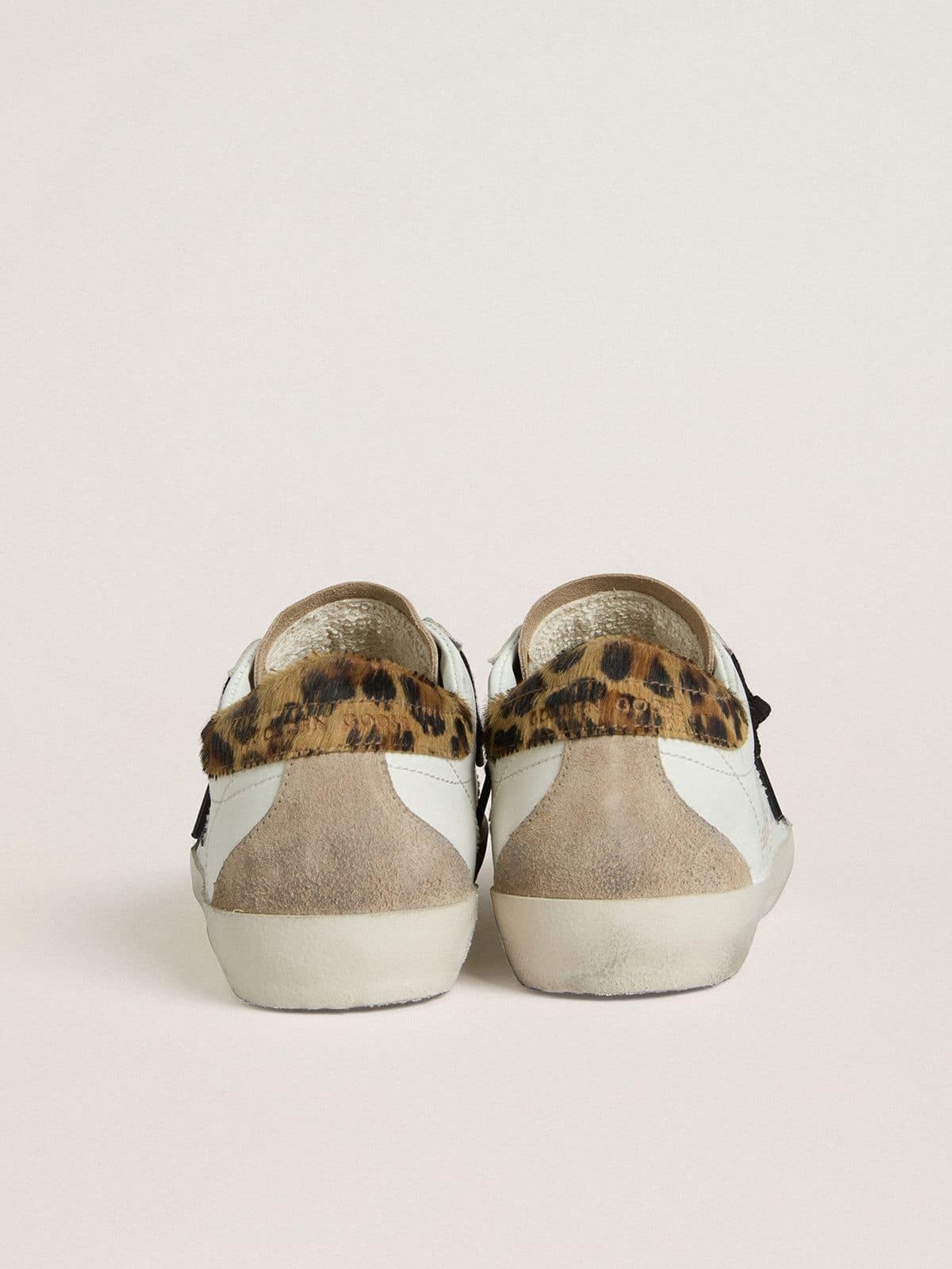 Women's Super-Star with black glitter star and leopard-print pony skin heel tab