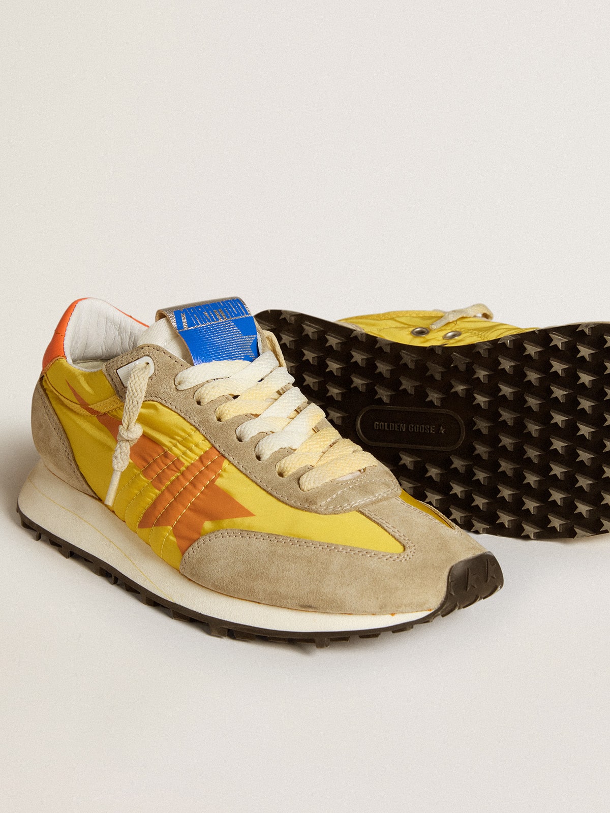 Women’s Marathon with yellow nylon upper and orange star