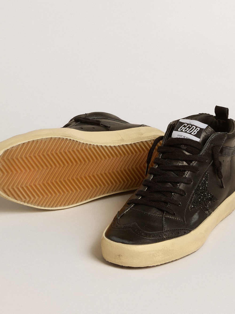 Women's Mid Star in black nappa with black glitter star and suede flash