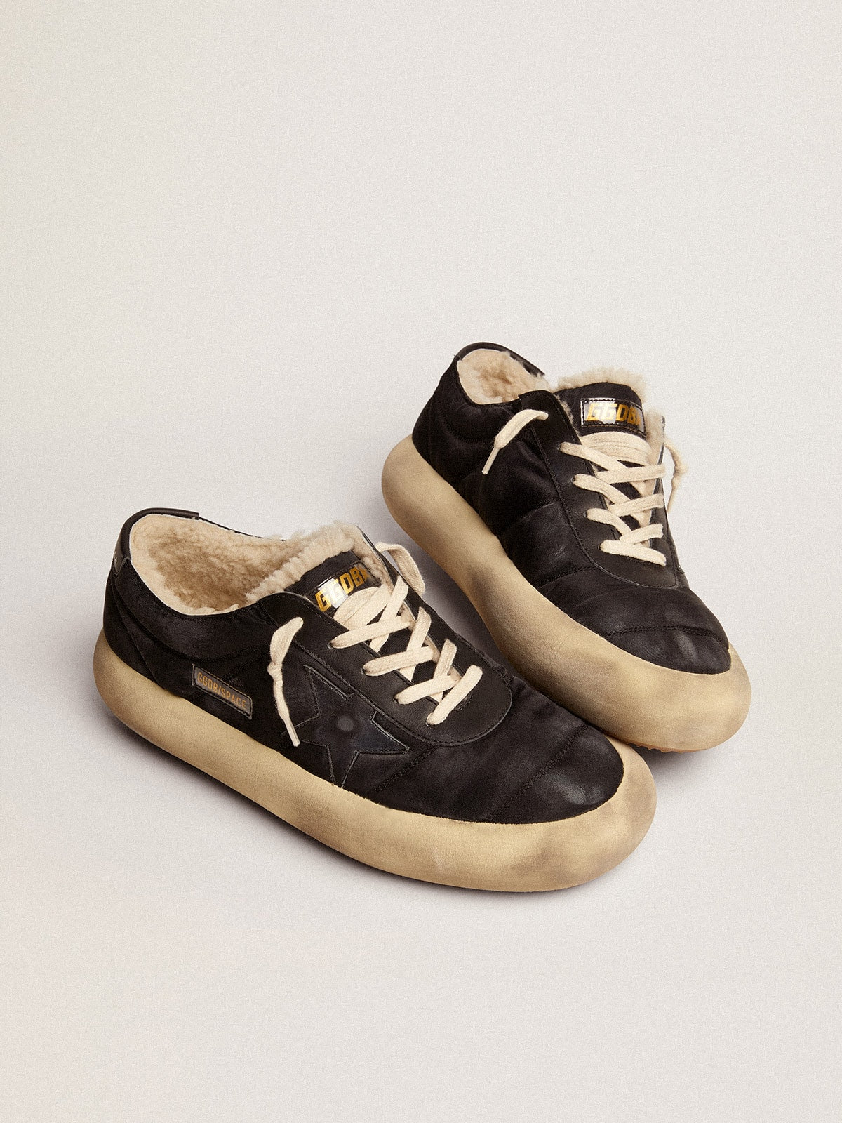 Women's Space-Star shoes in quilted black nylon with shearling lining