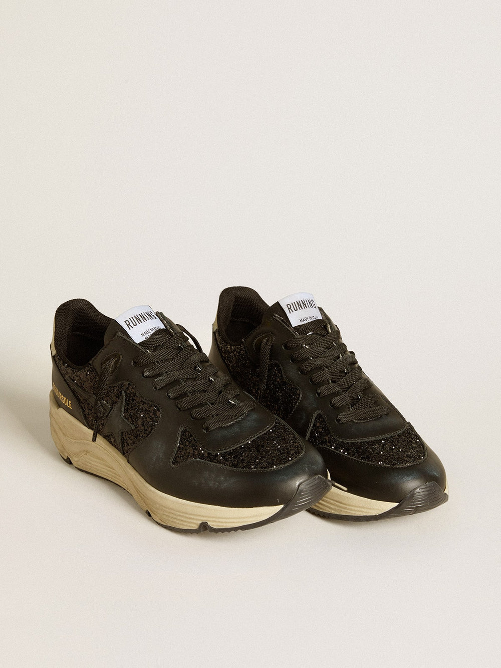 Women's Running Sole in black glitter with leather star and nubuck heel tab