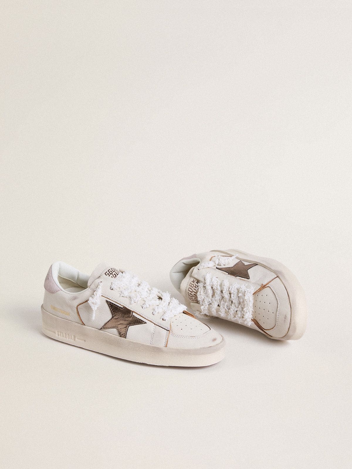 Stardan in nappa leather with metallic silver leather star and pink suede heel tab